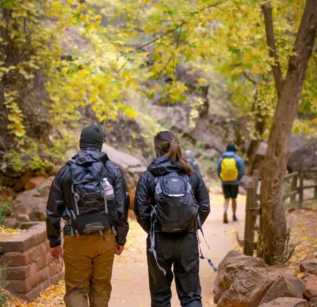 2 visitors hiking at zion